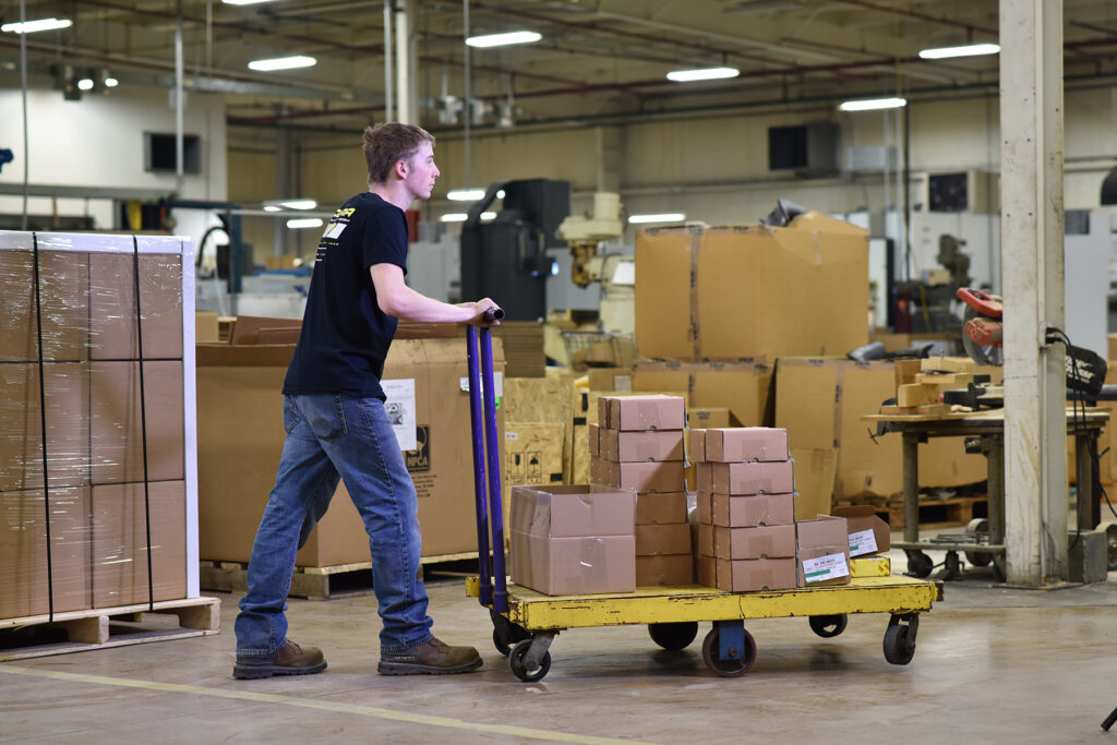 Material Handling worker with trolley