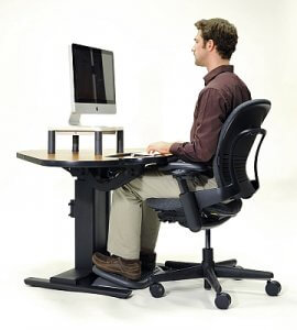 Man sitting at a computer workstation